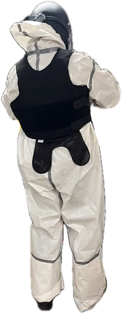 Fume hood technician wearing protective equipment
